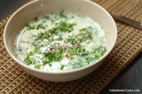 yogurt soup with rice and fresh herbs
