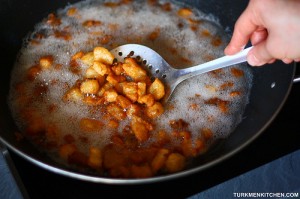 remove the golden brown cracklings with a slotted spoon